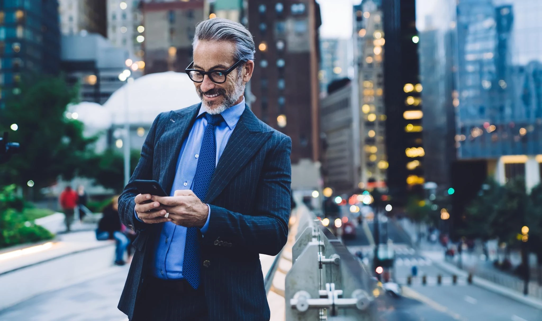 Person selecting a custom phone number on smartphone, showcasing personal identity and wireless freedom.
